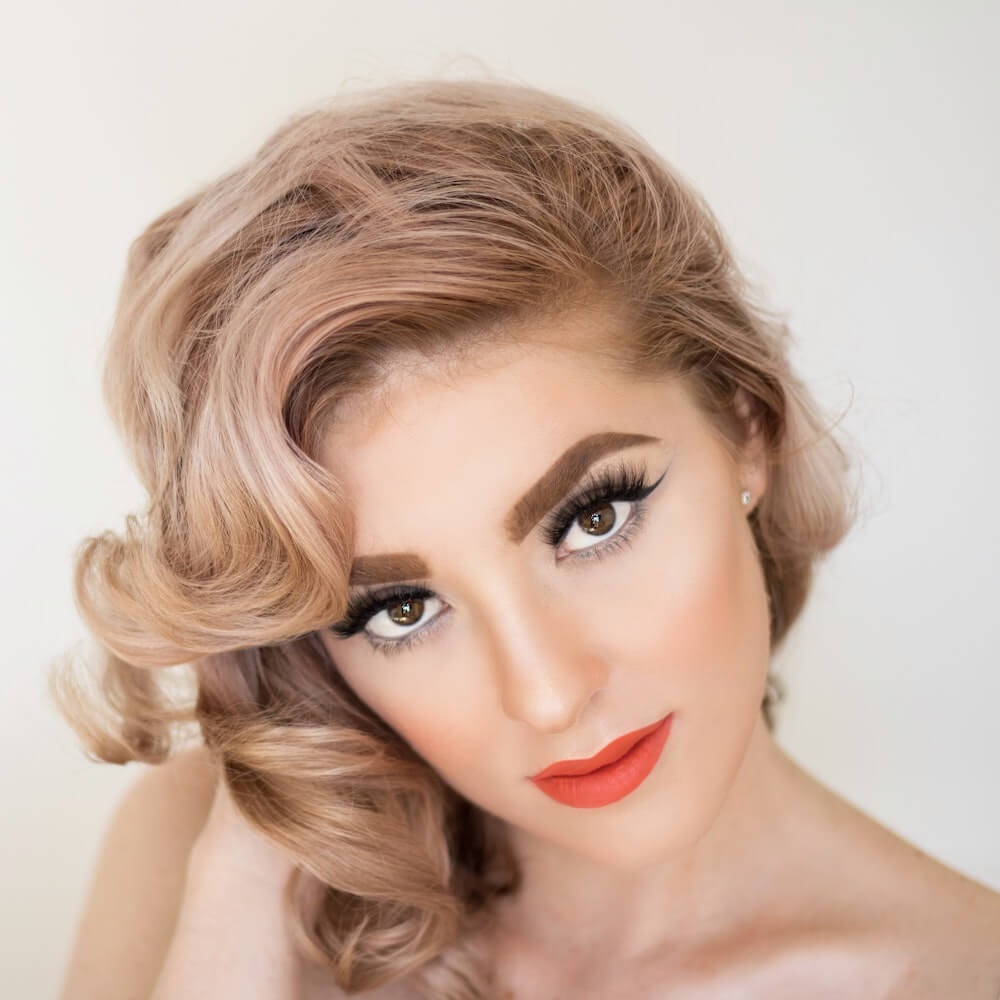 Woman with large pin curls