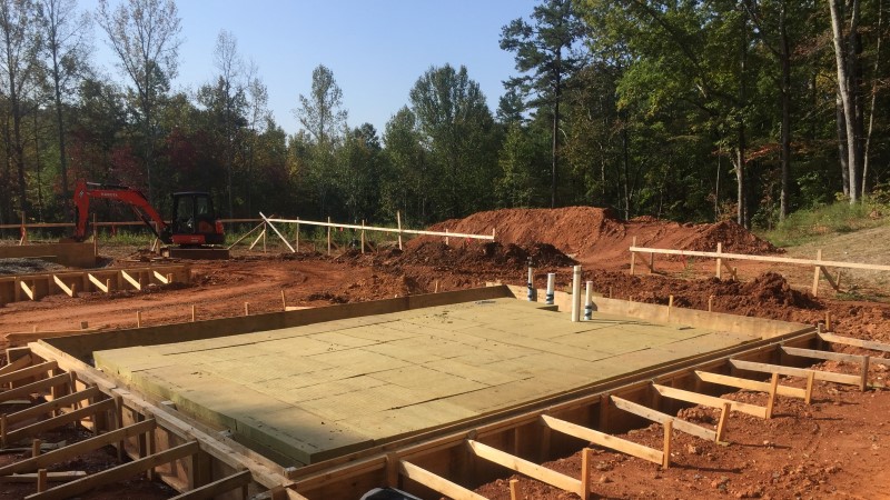 once that was really well compacted we dug our trenches for our the turn-down portion of our slabs