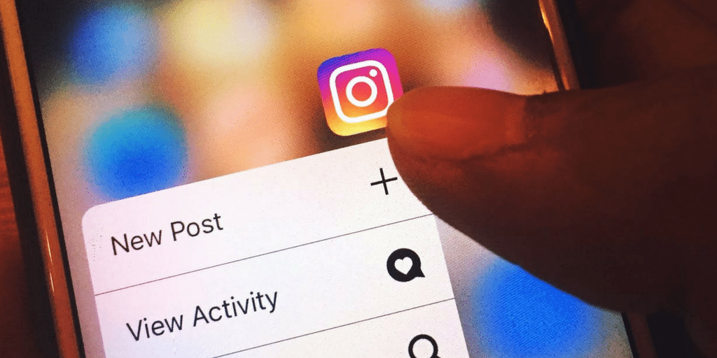 Person adding new post on instagram