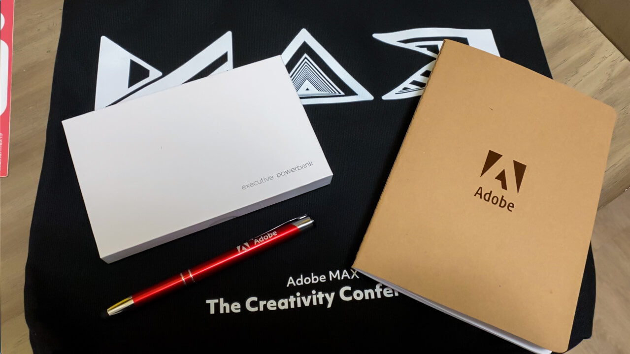 Adobe swag: Notebook, pen, bag
