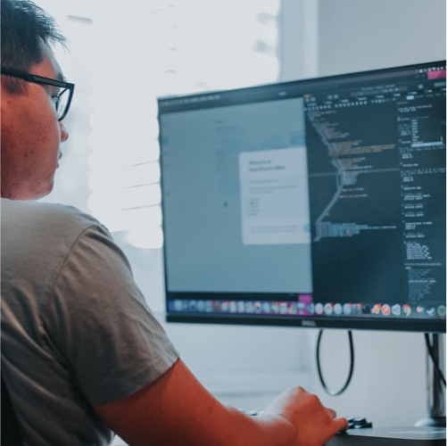 Man looking at a computer monitor