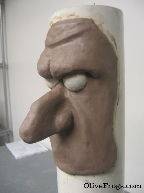 Sculpting progress of a 2ft tall cigarette's face