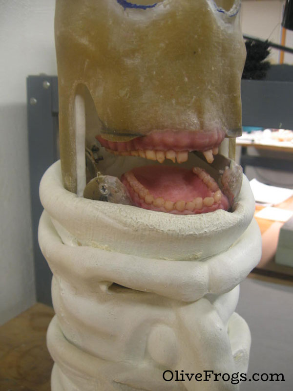 Sculpted and painted rotted teeth on a very large cigarette