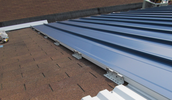 Metal roof over shingles