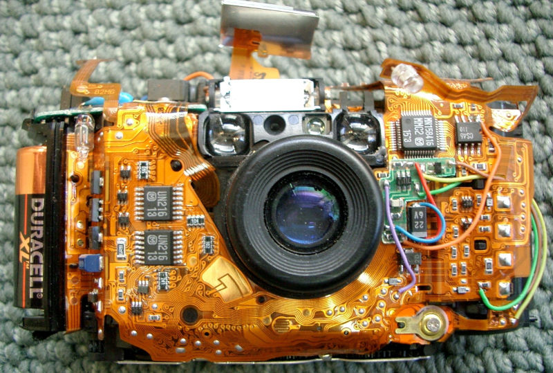 Internal components of a camera showcasing a rigid-flex PCB