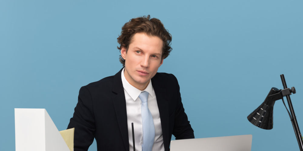 Man looking up in a "thinking" pose