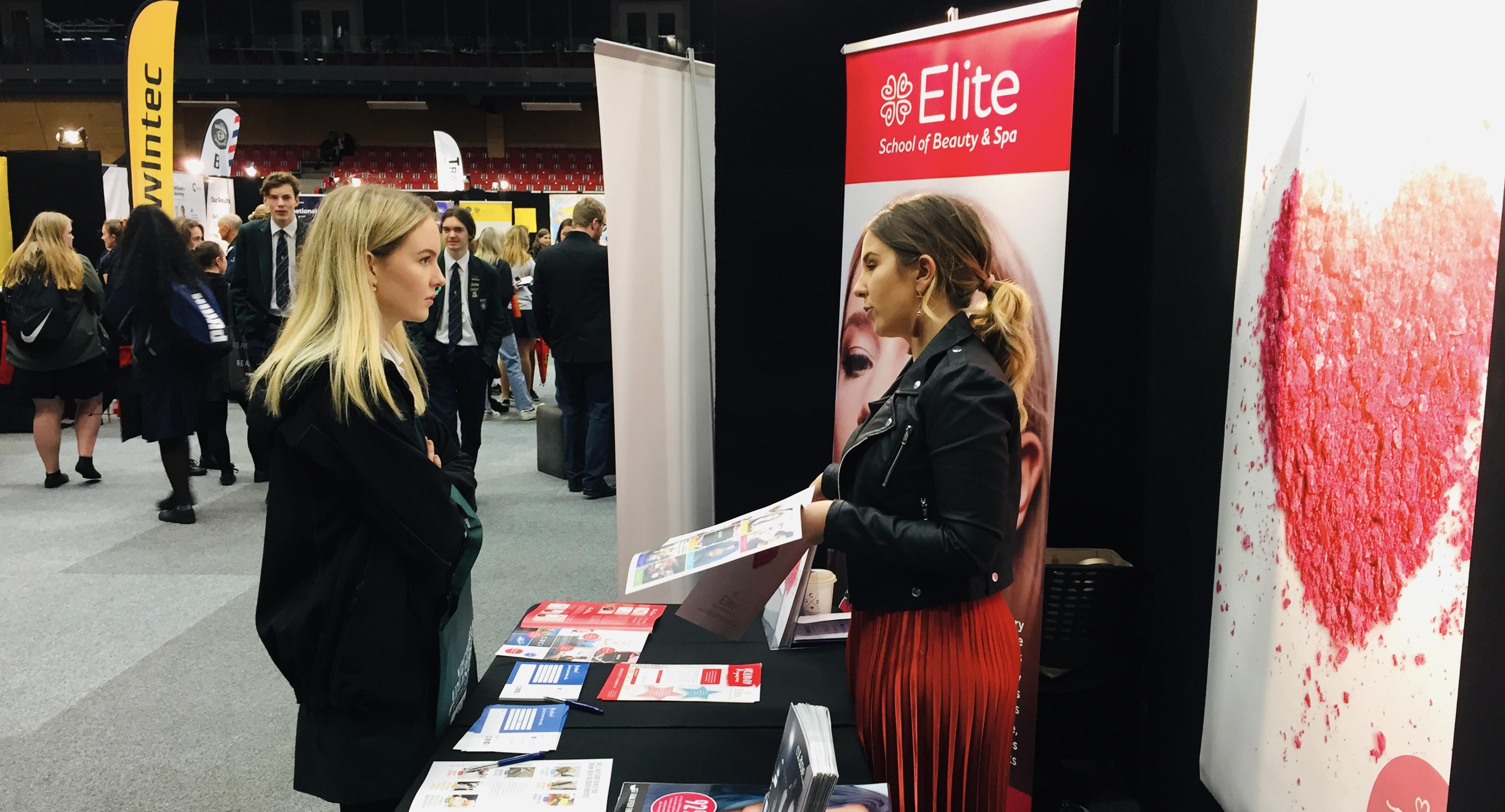 A student talks to a Career advisor at Canvas Careers Expo.
