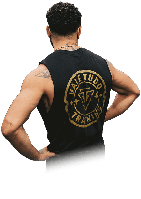 VTT coach Simeon wearing branded singlet shirt VTT logo on back