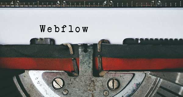 oude typemachine met lint en het woord webflow