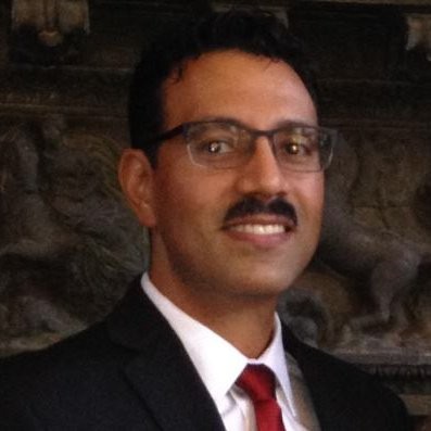 headshot image of John Matias