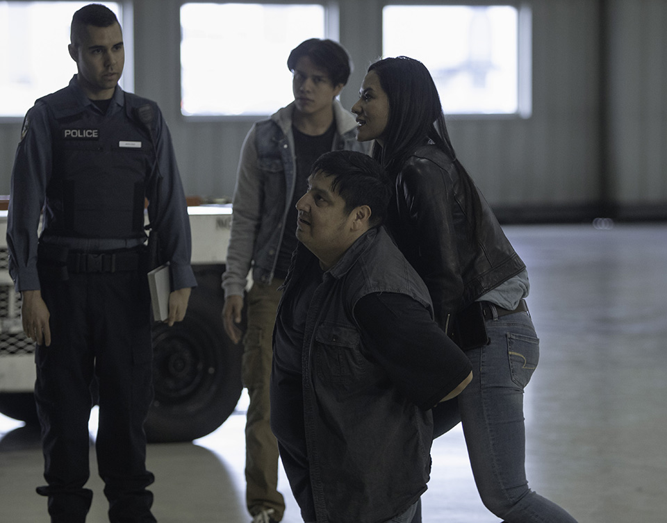 Why does Sam arrest Phil?