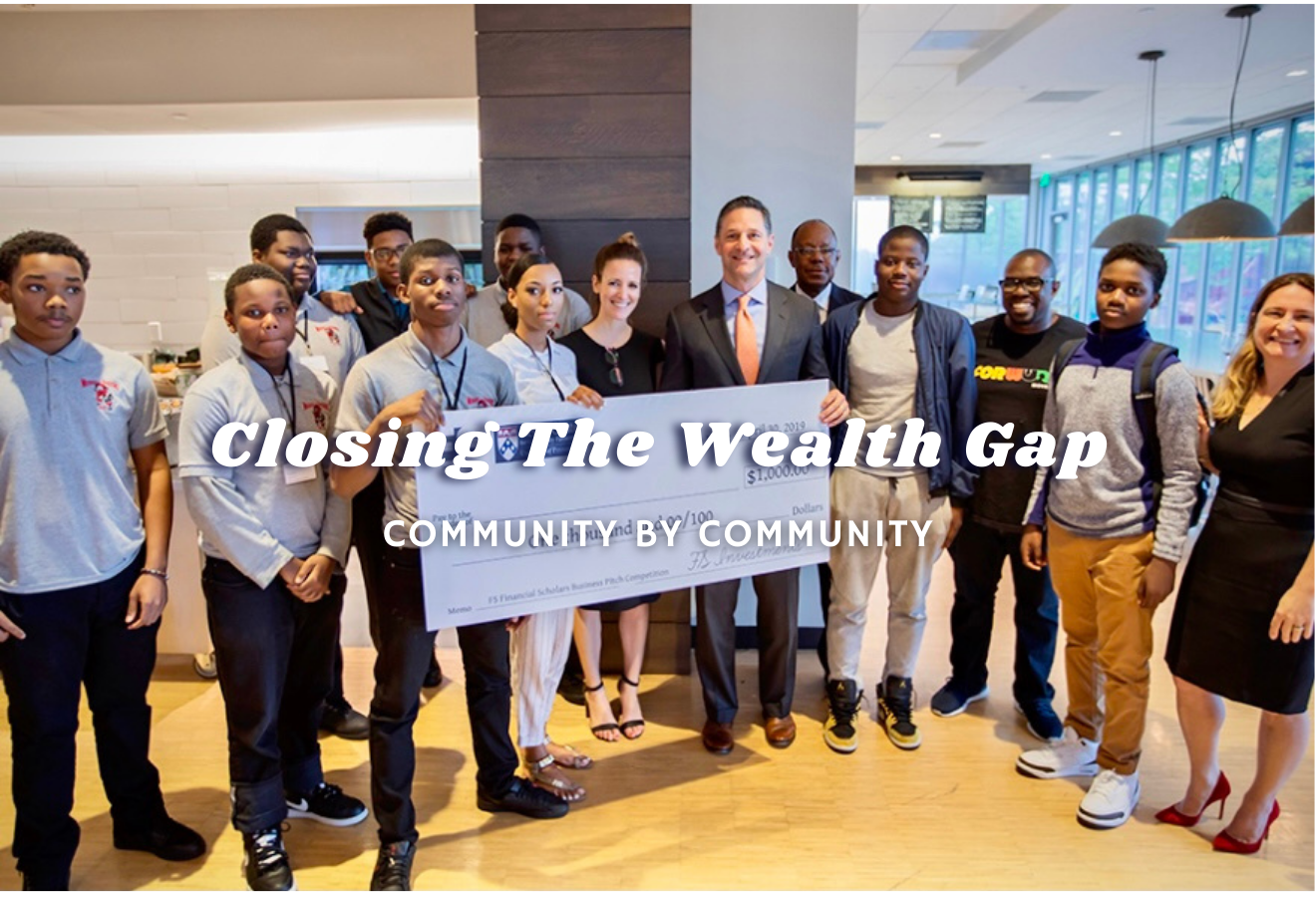 A photograph of the winners of the 2019 Bridges To Wealth and Philadelphia Financial Scholars pitch competition. Text overlayed says "closing the wealth gap, community by community."