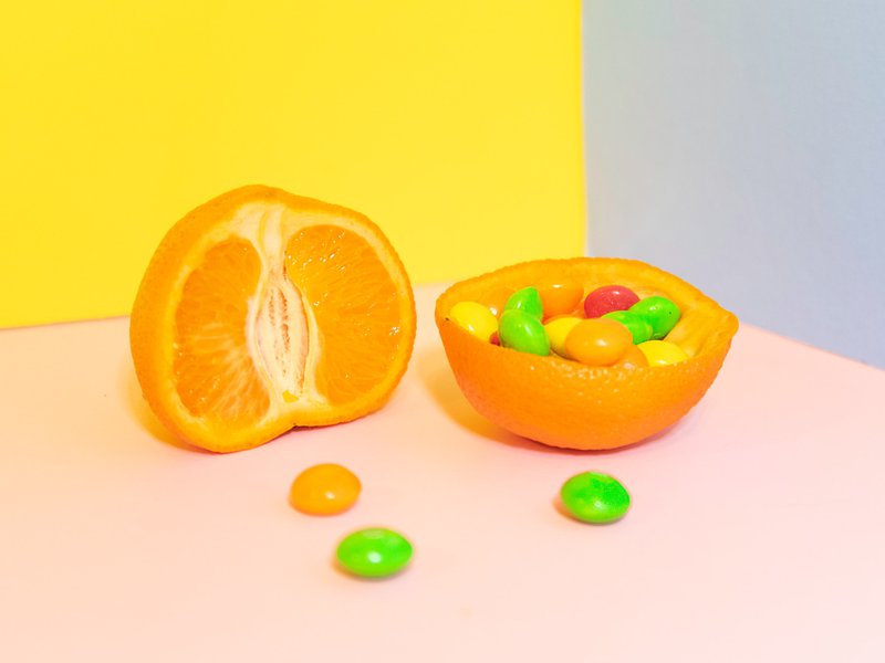 Today, the craft service table on the set of Spider-Man: Far from Home, they had a plethora of awesome things to eat, but the Skittles and clementines caught my eye. Should I choose a healthy and juicy piece of fruit or should I taste the rainbow? I opted for both and simply took three pieces of colored foam core as the background and snapped away. **Fun fact: clementines are easy to peel without ripping. Make sure to dry them off so that they don't drip on the foam core and ruin it.