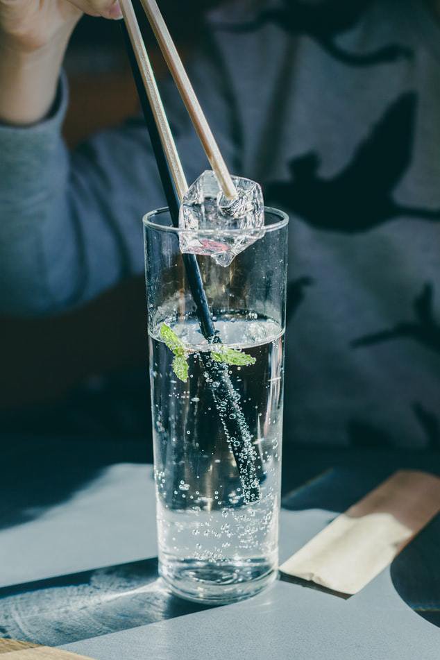 glass of sparkling water with ice healthy alternative to soda