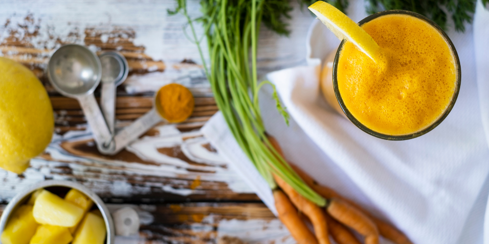 A Photo Of Ginger, Mango, and Carrot Smoothie