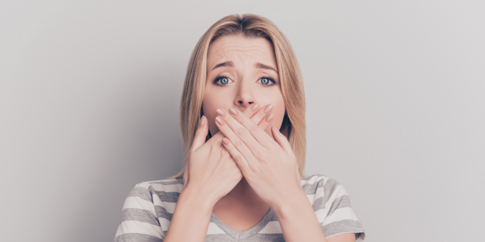A Photo Of A Woman That Is About To Vomit