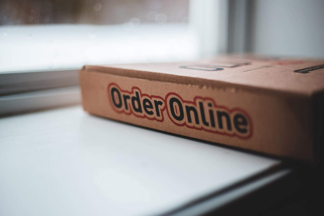 cardboard box of delivery pizza