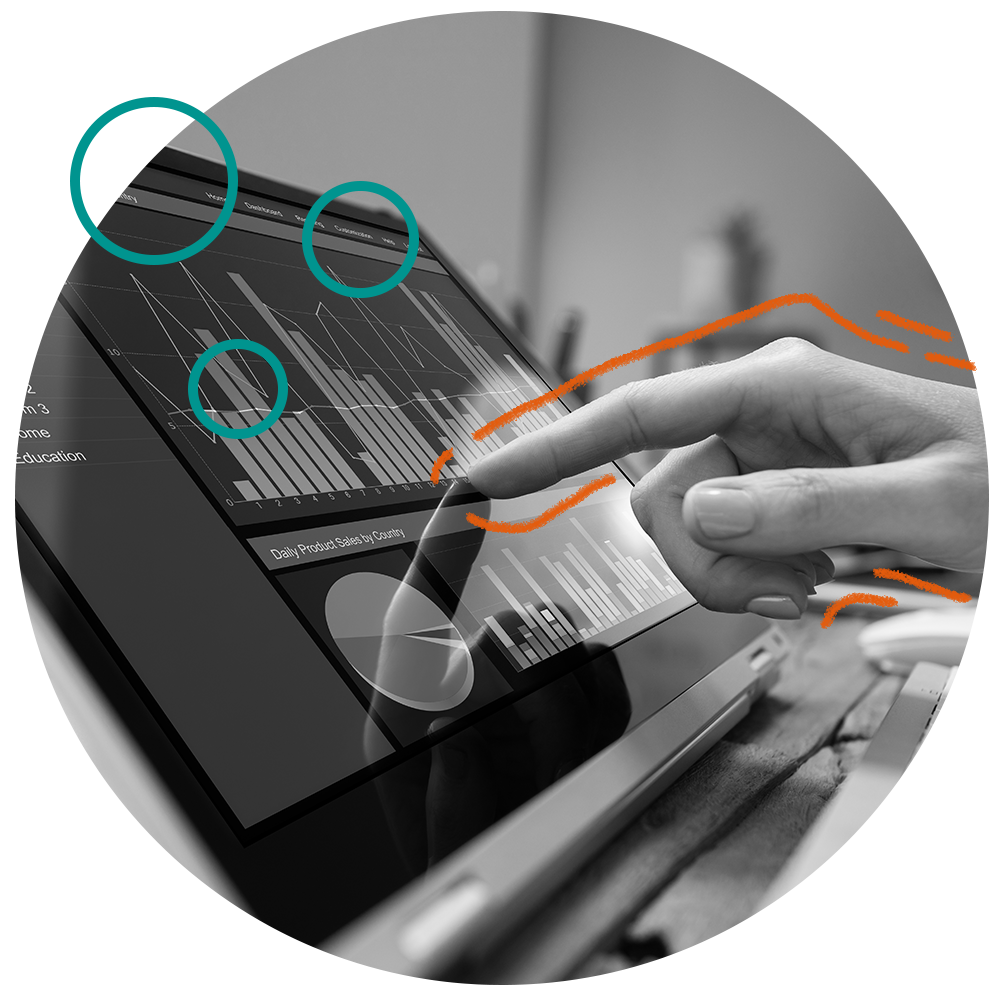 hand pointing to screen with graphs