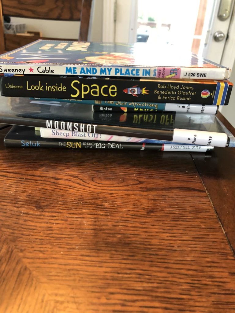 A stack of books to start our exploration of space for preschool kindergarten.