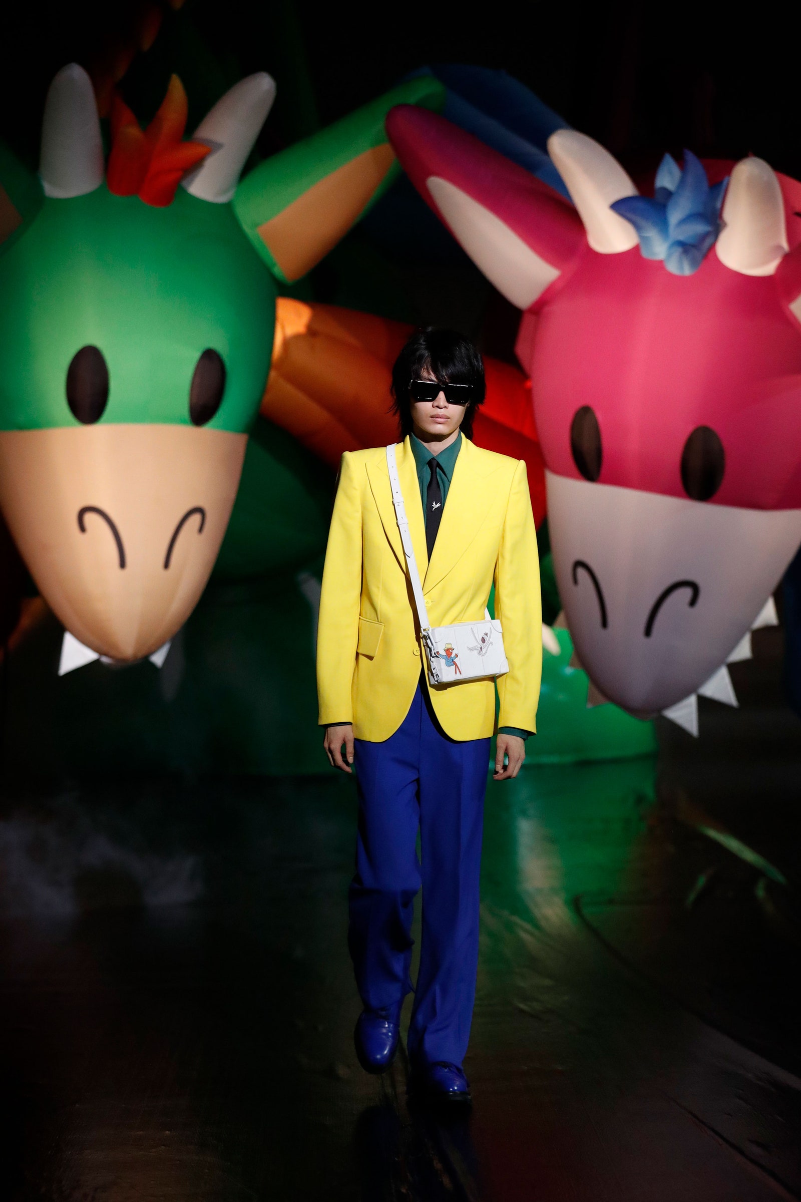 Image may contain Toy Clothing Apparel Human Person Long Sleeve Sleeve Costume Sunglasses and Accessories