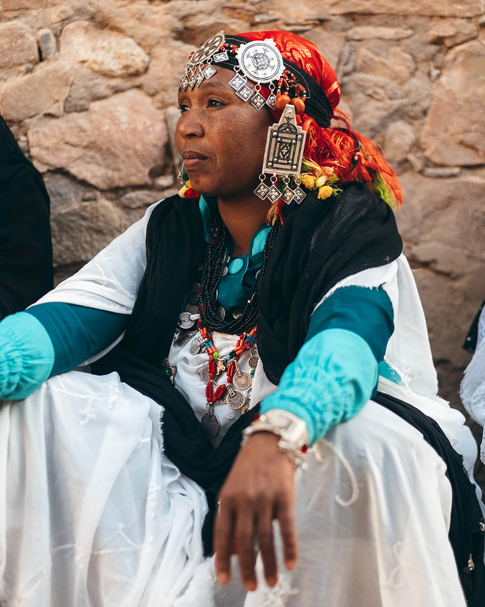 Woman weaver from the Anti Atlas wearing a traditional head jewelry
