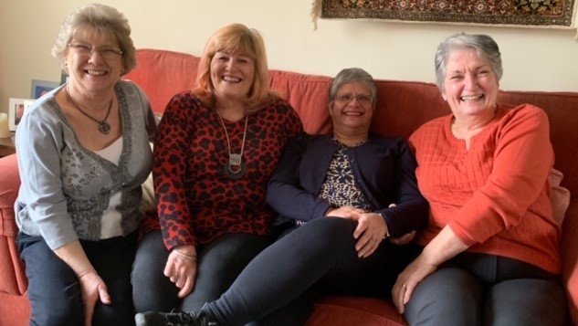 Four carers from the West Kent PF Support Group laughing