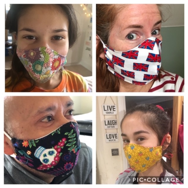 Lesley and her family modelling her masks
