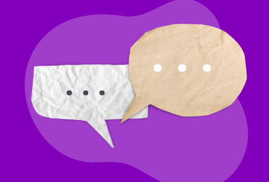 two speech bubbles on a purple background
