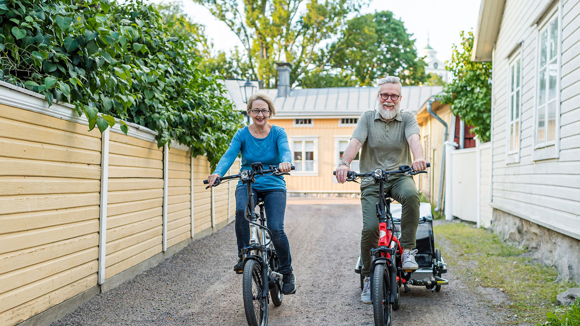 a pair of elderly people riding Tern HSDs