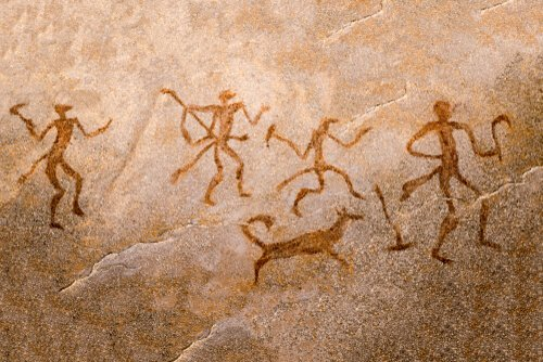 Caveman paintings illustrating interaction between human and canine