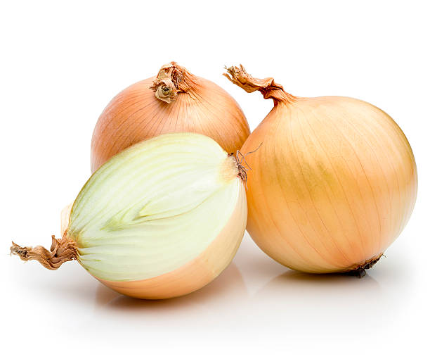 Onions Onions on a white background. onion stock pictures, royalty-free photos & images