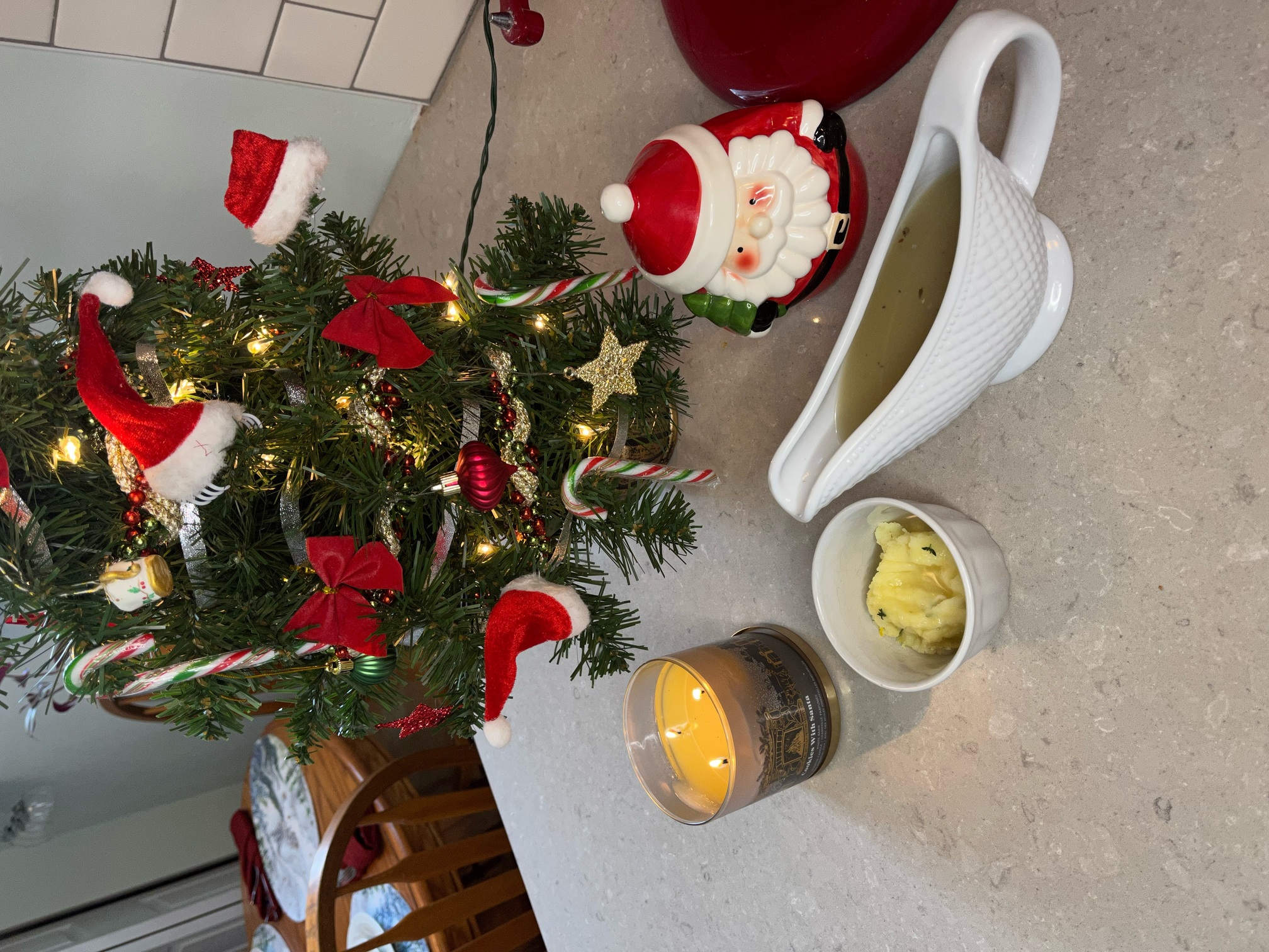 Gravy boat in front of a christmas tree