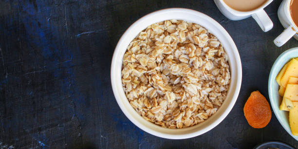 breakfast (oatmeal porridge, dairy products and more, snack) menu concept background. top view. copy space breakfast (oatmeal porridge, dairy products and more, snack) menu concept pumpkin spice oatmeal stock pictures, royalty-free photos & images