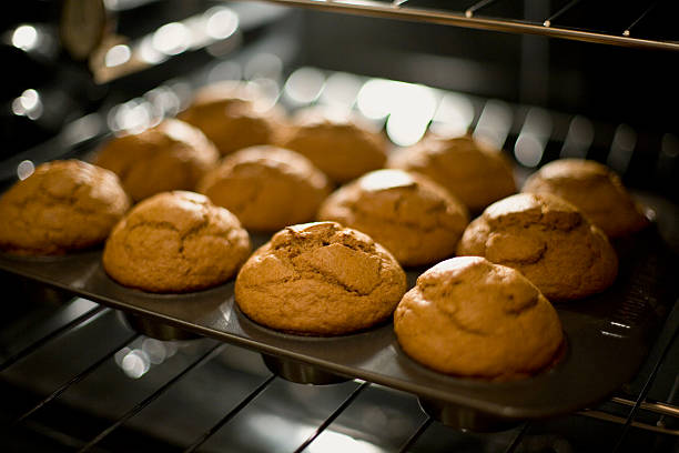 Pumpkin muffins Pumpkin muffins just coming out of the oven pumpkin cupcake stock pictures, royalty-free photos & images