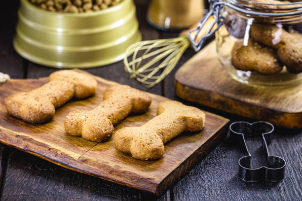 homemade dog biscuit after being baked, healthy pet food homemade dog biscuit after being baked, healthy pet food dog treat stock pictures, royalty-free photos & images
