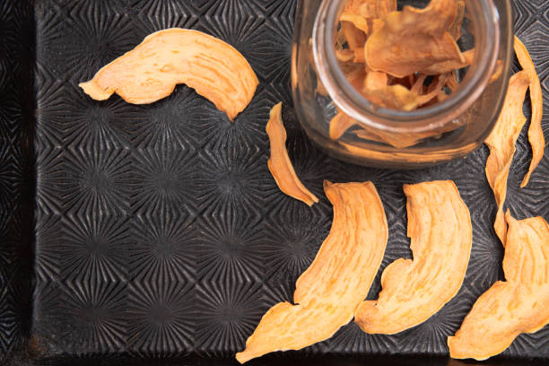 Sweet potato dog chews. Healthy, dehydrated or baked sweet potato dog chews or treats. sweet potato dog stock pictures, royalty-free photos & images