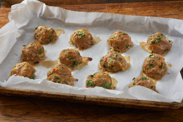 Italian Style Turkey and Spinach Meatballs Baked Italian Style Turkey and Spinach Meatballs spinach meatballs stock pictures, royalty-free photos & images