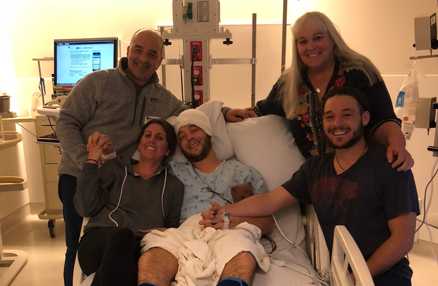 Jared Muscat and his family after brain surgery