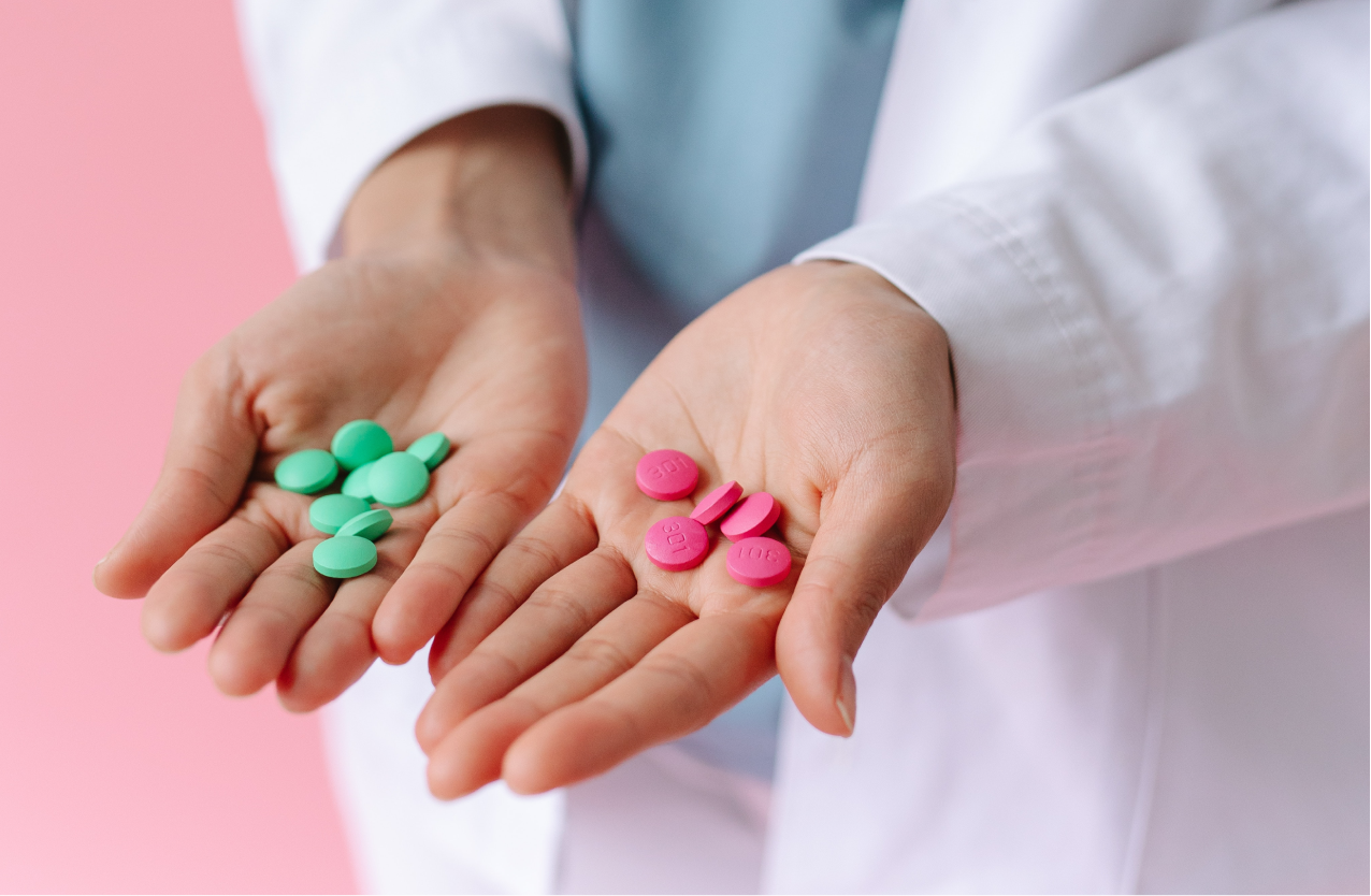Multiple medications in a doctor's hands
