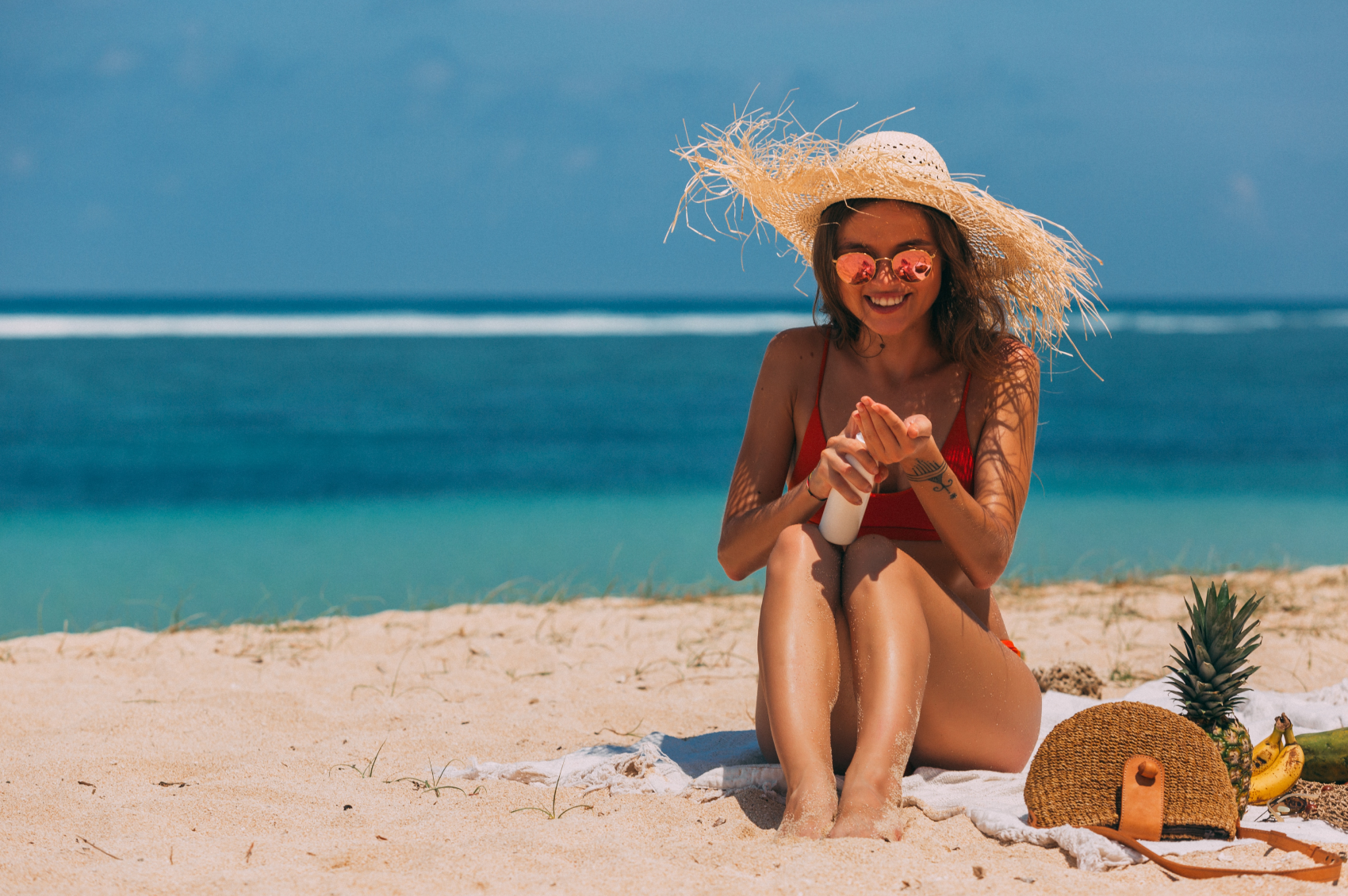 Woman on the beach getting vitamin D