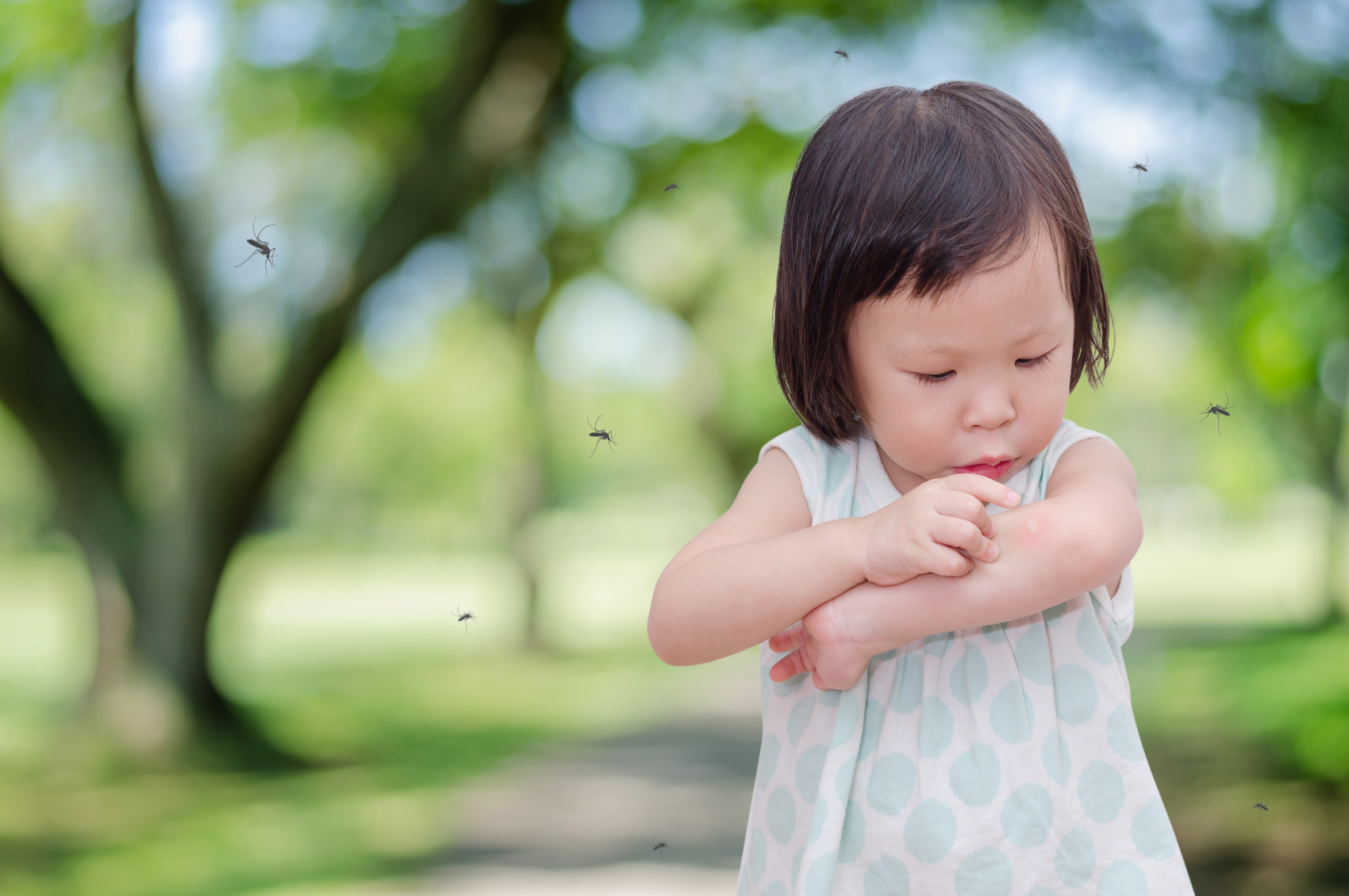 Young girl with epilepsy and chickenpox itching herself