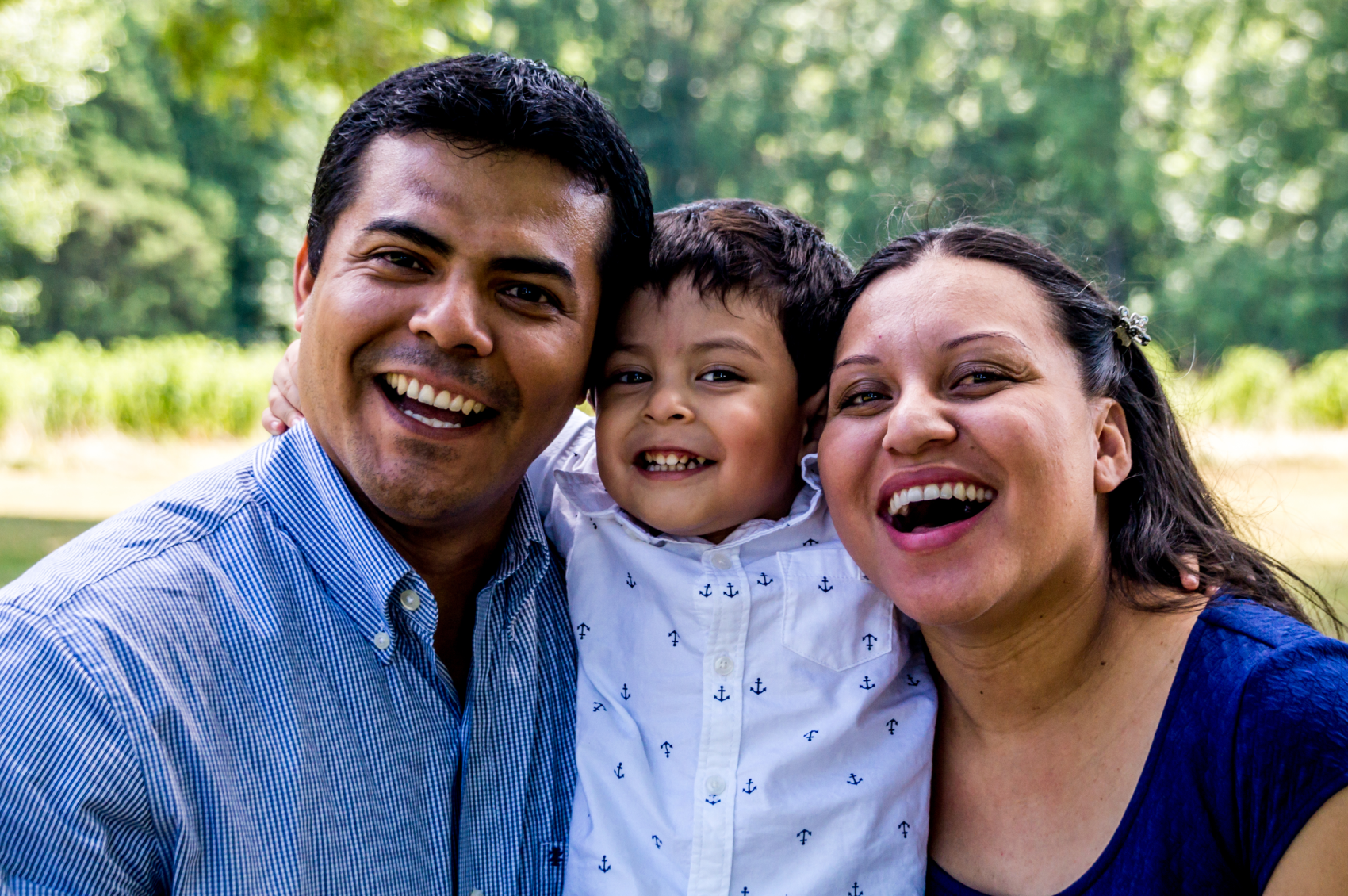 Latino family smiling