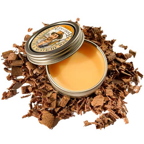 Strong hold SavvyJack mustache wax 1 oz tin. Open showing all natural golden color.