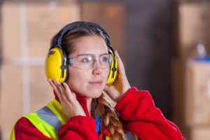 Woman at Work Wearing Hearing Protection