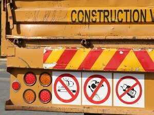 No Cell Phone Sign, Back of Construction Vehicle