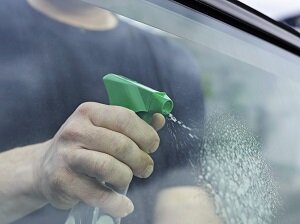 Cleaning Windows in Car