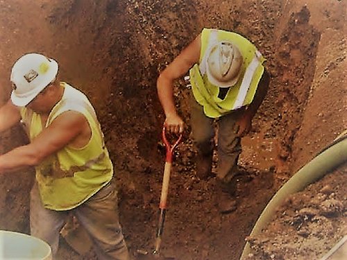 Two Workers in a Trench
