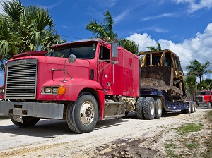 Big Truck Hauling Front End Loader