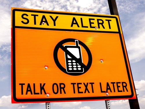 Road Sign, Stay Alert, Talk or Text Later