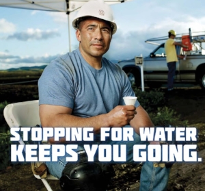 Stopping for Water Keeps You Going Construction Worker Taking a Break to Drink Water
